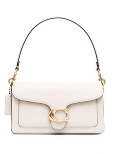 Tabby 26 shoulder bag from COACH featuring chalk white, calf leather, grained texture, gold-tone hardware, gold-tone logo plaque, detachable shoulder strap, adjustable detachable shoulder strap, foldover top with magnetic fastening, main compartment, internal slip pocket, internal zip-fastening pocket and internal logo stamp. Classic White Rectangular Flap Bag, Timeless White Rectangular Flap Bag, White Timeless Formal Satchel, Classic White Flap Bag, Timeless White Flap Bag For Evening, Modern White Flap Bag, Elegant White Flap Bag With Gold-tone Hardware, Classic White Flap Shoulder Bag, Timeless Beige Textured Leather Shoulder Bag