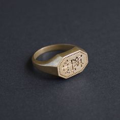 Merchant's signet ring, Europe 16th century. Brass cast. Classic Brass Signet Promise Ring, Classic Brass Signet Ring For Promise, Vintage Hand Forged Signet Ring Gift, Antique Engraved Signet Ring For Ceremonial Occasions, Byzantine Style Signet Ring For Anniversary, Antique Initial Ring With Engraving Option, Heirloom Brass Signet Ring For Wedding, Antique Ceremonial Signet Ring With Engraving Option, Antique Ceremonial Signet Ring With Intaglio