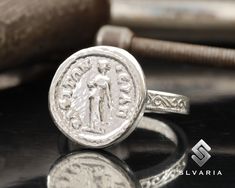 925 Silver Ancient Greek Coin Woman Signet Ring Handmade Anti-Tarnish Unique Dainty Ring Mythological Gift Fancy Lady Design Art Ring ⭐3 YEAR GUARANTEE FOR ANTI-TARNISH⭐ 💍Item Details💍 SKU CODE: ACRIT2031 ★ Material: 925 Sterling Silver (Rhodium Plated) ★ Silver Weight: App. 5.65 Grams {6 USA Size] ★ Ring Diameter: 2,3-2,7 mm ★ Ring Size: Available in variations  ★ Coin: Woman Portrait ★ Coin Size: 15X15,20 mm ★ Coin Metarial: 925 Sterling Silver (Rhodium Plated) ★ Ring Plate: Available in var Fancy Lady, Lady Design, Ancient Greek Coin, Ring Plate, Grece Antique, Art Ring, Greek Coins, Zierlicher Ring, Natural Stone Jewelry