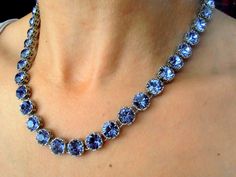 Handmade Tanzanite Blue Lace Filigree Platinum Plated 34 metal cups Art Deco Style Necklace made with Authentic Swarovski Crystal Elements. Great Sparkle Choose your pattern from drop down menu Also available in many other Crystal Colors, just email me for more information** Nickel Free Perfect for Bridesmaid gift too ** Crystal Color: Tanzanite Blue. Helpful tips for proper care: To avoid damaging or dulling Costume Jewelry, do not use jewelry cleaner or soak the jewelry in water. When dressing Elegant Christmas Party Necklaces, Crystal Jewelry For Christmas Party, Elegant Christmas Jewelry For Formal Occasions, Elegant Christmas Formal Jewelry, Round Adjustable Bridal Necklace For Party, Round Bridal Necklace For Party, Adjustable Bridal Necklace For Party, Blue Jewelry For Christmas Party, Blue Christmas Party Jewelry