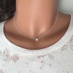 A beautiful small handmade star charm on a sterling silver chain, this star choker necklace made with sterling silver is inspired by how the stars shine with their own light in the sky, each person also has their own special light. This cute and dainty choker symbolize the ethereal and the dreams, the star necklace is a nice gift for star and astronomy lovers. This listing is for one silver star necklace. MADE FROM - Available in 925 Sterling silver. Nikel-free and lead-free. - Chain: Sterling s Star Choker, Star Necklace Silver, Woman Jewelry, Dainty Choker, Graduation Gifts For Her, Celestial Jewelry, Choker Necklaces, Necklace Sterling Silver, Star Charms