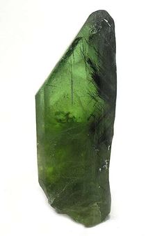 T06-337 Peridot+with+Ludwigite+inclusions Suppat,+Kohistan,+Pakistan Miniature,+5.3+x+2.1+x+1.4+cm A+sharp,+well+formed,+transparent,+lustrous,+lime-green,+peridot+crystal+has+included+sprays+of+acicular,+black,+ludwigite,+a+rare+magnesium,+iron,+borate.+The+peridot+is+transparent,+lustrous,+and+a+rich+green+color.+The+gem+weight+of+this+specimen+is+____+grams.+IN+PERSON+it+is+very+dramatic!+the+size+is+also+quite+good,+combined+with+the+sharpness+of+the+termination.+This+is+an+exceedingly+f... Prime Colors, Peridot Crystal, Rich Green, Green Peridot, World Of Color, Green Color, Lime Green, Precious Stones