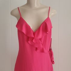 Brand: 1 State Condition: Brand New With Tag Description: Pink Women’s Wrap Dress, V- Front With Ruffles. Adjustable Spaghetti Strap. Tie Around Waist. Material: 100% Polyester Machine Wash Size: 6 Approximate Measurements: Pit To Pit 16” Pit To Bottom 37” Adjustable Strap Spring Camisole Dress For Date Night, Pink Camisole Dress For Evening, Pink Spaghetti Straps Sleepwear For Vacation, Elegant Camisole Dress With Ruffles, Camisole Dress With Ruffles For Spring, Pink Camisole Evening Dress, Lined Camisole Dress, Elegant Ruffled Camisole Dress, Spring Camisole Dress With Ruffles