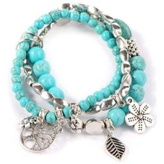 Invoke energy from the nature around you with this turquoise beaded bracelet and its beautiful silver charms - the Tree of Life, feather, and flower. This set of three bracelets comes with adjustable and stretchable bead pieces. Typically delivers within 2-4 business days! 1032 Hollow Tree, Turquoise Bead Bracelet, Women Bracelet, Bracelet Online, Bleu Turquoise, Tree Leaves, Leaf Flowers, Flower Plant, Turquoise Beads