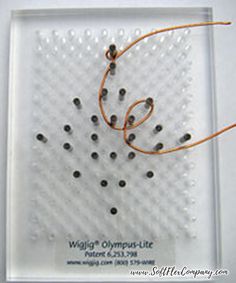 an image of a piece of glass with some wires attached to it and the words wright's olympic - life written on it