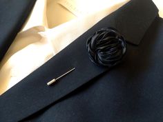 Black lapel pin Black suit brooch . This is listing for lovely Silk flower on lapel pin. Every petal of the flower is hand made by me and they are assembled together to form a very charming flower.  Elegant flower Boutonnière for special occasions. The size of the flower is about 4 cm. /1,75 inches/ .  If you want some different size of the flower, let me know and I will make a Custom order for you. You can buy 1 or set of 3,5,7 or 10.  More lapel pins: https://www.etsy.com/shop/LiLaGarden?ref=s Suit Brooch, Lapel Pins Suit, Black Boyfriend, Costume Noir, Wedding Pins, Tie Styles, Black Suit, Elegant Flowers, Silk Flower