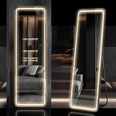 two mirrors with lights in the middle of them and a couch on the other side