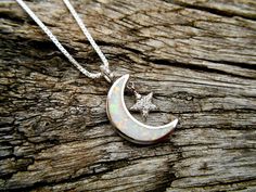 "Sterling Silver Crescent Moon and Star WHITE Opal Necklace Minimalist Necklace / Dainty Necklace Your choice of 16\" or 18\" Sterling Silver Box Chain with Lobster Clasp .925 Sterling Silver  Perfect Gift for 10th or Sweet 16 Birthday! Measurements For Moon & Star Pendant:  Height: 23.5mm (0.9\") Width: 14mm (0.6\") Ships in a silver pendant box lined with a black velveteen foam insert, ready for giving!" White Celestial Jewelry Gift, Celestial White Jewelry For Gift, Celestial Style White Jewelry For Gifts, Celestial Style White Jewelry Gift, White Crescent Spiritual Jewelry, Moon Shaped White Necklace For Gift, White Moon Shaped Necklace For Gift, White Moon-shaped Necklace For Gift, White Moon Shaped Celestial Jewelry