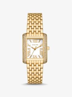 Side panels of understated pavé crystals add shine to the rectangular face of our petite Emery watch. The polished beveled strap is made of gold-tone stainless steel, while the dial features Roman numeral indexes for a luxurious finish. Glamorous enough to pair with evening looks yet understated enough to complement a simple T-shirt and jeans, this is a timeless style you’ll never want to take off. Classic Gold Rectangular Diamond Watch, Rectangular Gold Diamond Watch, Timeless Rectangular Diamond Watch With Accents, Gold Jewelry With Diamond Accents And Rectangular Dial, Elegant Rectangular Yellow Gold Diamond Watch, Elegant Yellow Gold Rectangular Diamond Watch, Luxury Gold Rectangular Diamond Watch, Luxury Rectangular Jewelry With Gold-tone Hardware, Timeless Gold Diamond Watch With Rectangular Dial