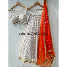 We offering every occasion outfits like haldi Outfits, bridemaids lehenga choli,mehendi outfits, engagement Ceremony lehenga choli, sangeet ceremony lehenga choli, tilak/sagan Ceremony outfits,haldi Ceremony lehenga choli, reception lehenga choli, blessing Ceremony outfits and indian wedding outfits. FABRIC DETAILS LEHENGA FABRIC : Georgette WORK : Zari Weaving With Embroidery Work Lace Border FLAIR : 3.50 mtr Inner : Cotton With Canvas and can can layered net Fancy Lace  BLOUSE Blouse Fabric : Row Silk Work : Zari, Sequence Embroidery Work Fancy Lace  Dupatta Fabric : Net Size : 2.50 MTR Work : Embroidery Sequins Lace  #Handling time, don't worry, just tell me, I will process it accordingly and deliver on or before a delivery date you mention. Festive Off-white Gota Work Sets, White Cutdana Dress For Diwali, Off White Sets With Gota Work For Diwali, Off White Gota Work Sets For Diwali, White Cutdana Wedding Dress, White Dress With Zari Work For Navratri, White Chanderi Dress With Pallu, White Palazzo Set With Dupatta For Party, Navratri White Dress With Zari Work