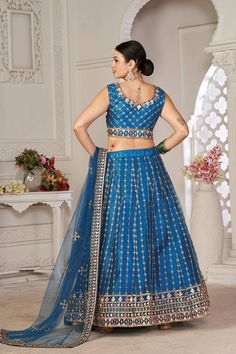 color-blue, fabric-net, work-embroidered, brand-name-krupali-savani,occasion-festivewear, occasion-wedding-guest, womenswear,ideal-for-women, lehengas, Product Features: Color: Blue Lehenga Fabric: Net Choli Fabric: Net Work: Embroidered Work Sleeves: Sleeveless Neck Type: Round Neck Wash Care: Dry Clean Occasion: Festivewear, Wedding Guest Product Type: Lehenga Choli with Dupatta Disclaimer: There will be slight difference in digital to actual image Lehenga Wedding Guest, Lehenga Fabric, Work Lehenga, Lehenga Wedding, Blue Lehenga, Lehenga Choli, Lehenga, Wedding Guest, Round Neck