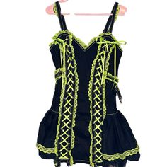 This Is A Super Cute Medium Tripp Nyc Black And Lime Green Laced Corset Dress With Attached Chains For A Super Fun Grunge Goth Look! Nwot I Tried It On Once And Didn’t Like It On Me But The Tag Got Caught In The Zipper And Had To Be Taken Off! Chains Still Have Protective Plastic On Them! Fun Tutu Flare At The Bottom, This Dress Is Super Hard To Find! Can Fit A Medium/Large! Super Snatching Dress! Basically Impossible To Find Anymore! Leave Any Questions Below! I’m Always Open To Offers As Well Black Mini Dress With Lace Trim For Costume Party, Black Lace Trim Mini Dress For Costume Party, Black Sleeveless Boned Corset Dress, Black Summer Corset Dress For Costume, Summer Black Corset Costume Dress, Black Corset Dress For Summer Costume, Black Summer Costume Dress, Black Sleeveless Costume Dress, Sleeveless Black Costume Dress