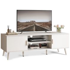 George Oliver Color: White | George Oliver Hateya Solid Wood 55.1" W Storage Credenza 19.1 H x 55.1 W x 15.7 D in White | 42" | Wayfair Tv Table Stand, Modern Media Cabinets, 55 Inch Tv, Living Room Entertainment Center, Tv Console Table, Support Tv, Tv Stand With Storage, Living Room Entertainment, Media Furniture