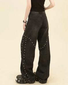 Grunge style black denim jeans with a high waist and wide legs, accented with rivet details for a unique and rebellious look Size: • S: Waist: 64cm/ 25.2 in, Hips: 100cm/ 39.4 in, Length: 106cm/ 41.7 in• M: Waist: 68cm/ 26.8 in, Hips: 104cm/ 40.9 in, Length: 108cm/ 42.5 in• L: Waist: 72cm/ 28.3 in, Hips: 108cm/ 42.5 in, Length: 110cm/ 40.6 in• XL: Waist: 76cm/ 29.9 in, Hips: 112cm/ 44.1 in, Length: 112cm/ 44.1 inMaterial: Denim Edgy High Waist Baggy Jeans, Edgy Baggy High-waisted Jeans, Edgy Baggy High Waist Jeans, Edgy Wide Leg Flare Jeans For Streetwear, Edgy Wide-leg Flare Jeans For Streetwear, Edgy Baggy High Waist Flare Jeans, Edgy High-waist Jeans For Streetwear, Edgy High Waist Jeans For Streetwear, Edgy Black Baggy Flare Jeans