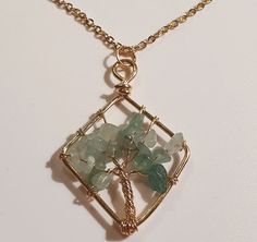 Hand crafted Natural Green Aventurine Crystal. Wire wrapped with the tree of life in gold plated copper wire, On a 40cm long 18K Gold plated Stainless Steel Chain with 5cm extender Pendant size: approx 4cm X 3cm Aventurine is the stone of Luck and Abundance. Wear it close to bring prosperity & good fortune into your life! Will be sent in a organza gift pouch. Green Aventurine Crystal, Aventurine Crystal, Gift Pouch, Healing Stone, Green Aventurine, Watch Necklace, Steel Chain, Stainless Steel Chain, Healing Stones