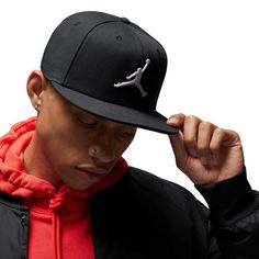 Your style leaps above contenders with this Jordan Brand Pro hat. It features the iconic Jumpman in raised embroidery for a 3D-like effect. This solid snapback is easy to adjust for the ideal fit. Breathable Snapback Baseball Cap With Adjustable Fit, Breathable Snapback Hat With Flat Brim For Sports Events, Breathable Adjustable Snapback Baseball Cap, Breathable Flat Brim Snapback Hat For Sports Events, Sporty Outdoor Fitted Hat With Flat Brim, Sports Flat Cap For Baseball Season, Black Breathable Flat Cap, Sporty Flat Cap Fitted Hat For Sports, Black Flat Brim Fitted Hat For Sports