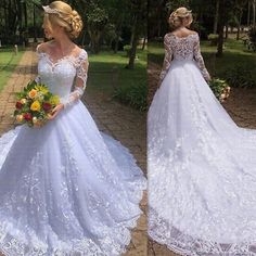 a woman wearing a white wedding dress with long sleeves and flowers in her hair, standing outside