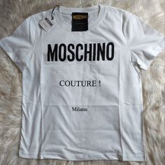 New Season Moschino Tshirt With Logo Design Size M Comes With Tag Classic Logo Print T-shirt For Spring, Casual Summer Tops With Signature Print, Cotton Tops With Signature Print For Spring, White Signature Print Top For Streetwear, White T-shirt With Signature Print For Summer, White Summer T-shirt With Signature Print, Casual Summer T-shirt With Signature Print, White Tops With Signature Print For Summer, White Summer Tops With Signature Print