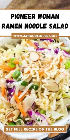 a white bowl filled with coleslaw salad on top of a wooden table