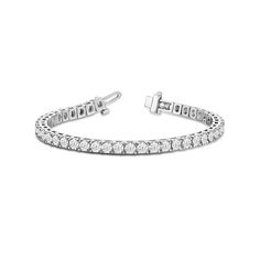 Whether worn solo or stacked, this classic tennis bracelet is guaranteed to bring brilliance to any look. This piece of jewelry features a single, continuous row of round diamonds - with each set in a four-prong box-shaped basket setting. Square Basket, Basket Setting, Infinity Pendant, Gorgeous Engagement Ring, Tennis Bracelet, Lab Diamonds, Diamond Earrings Studs, High Quality Jewelry, Diamond Studs