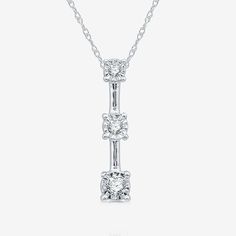 Elevate your style with our Women�s 1/10 CT. T.W. Lab-Grown Diamond Pendant Necklace in sterling silver. This elegant piece features three radiant lab-grown diamonds set in a sleek linear design, showcasing a rounded carat weight of 1/10 ct. t.w. The pendant measures 18.8mm in length and 4.2mm in width, and it hangs gracefully from an 18-inch rope chain secured with a spring ring clasp. Packaged in a beautiful gift box, this necklace makes a perfect present for special occasions or a stunning ad Three Stone Round Diamond Necklace, Classic Three Stone Necklace Gift, Classic Three Stone Necklace For Gift, Classic Three Stone Necklace As Gift, Classic Three Stone Necklaces For Gifts, White Three Stone Jewelry, Linear Design, Stone Pendant Necklace, Chic Accessories