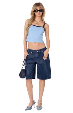 A relaxed silhouette and smart pinstripes amplify the trend-savvy appeal of denim Bermuda shorts rendered in a medium-blue wash. Zip fly with button closure Five-pocket style 100% cotton Machine wash, dry flat Imported Trendy Denim Bottoms With Vertical Stripes, Trendy Pinstripe Bottoms For Summer, Trendy Pinstripe Summer Bottoms, Casual Vertical Stripes Denim Jeans, Trendy Blue Bottoms With Vertical Stripes, Striped Denim Shorts For Spring, Casual Vertical Striped Jeans For Summer, Denim Jeans With Vertical Stripes, Casual Summer Jeans With Vertical Stripes