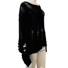 This goth black hole knit sweater is one of the best choices for women who are looking for something different and unique. Made of lightweight fabric, this Cool Hollow Out Pullover Top For Women features a super cool design with a deep hole in the front and back that is covered by black lace panels. This goth top comes with a drapey wide neckline and a long-sleeve design. It is compatible to be worn in any season of the year! Please check out our size chart carefully Estimated Time of Delivery: Black Oversized Edgy Sweater, Edgy Oversized Black Sweater, Black Oversized Sweater With Edgy Style, Alternative Black Long Sleeve Sweater, Black Knit Streetwear Tops, Alternative Style Long Sleeve Black Sweater, Black Gothic Sweater For Streetwear, Black Oversized Alternative Sweater, Black Oversized Alternative Style Sweater