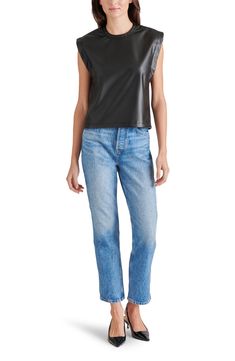 This statement-making muscle tee is crafted from buttery-soft faux leather in a boxy silhouette. 22 1/2" length (size Small) Crewneck Sleeveless 100% polyurethane Spot clean Imported Muscle Tee, Muscle Tees, Black Fits, Nordstrom Rack, Steve Madden, Faux Leather, Nordstrom, Crew Neck, Size Small