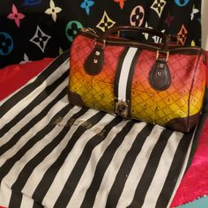 Rare Hard To Find L.A.M.B Rasta Bag. Comes With Dust Bag. Super Cute Great For Any Collection. There Are A Few Teeny Tiny Scuffs On Bottom Of Bag But Nothing Major. Still In Excellent Condition. I Never Used It. Awesome Rasta Bag From Gwen Stephanies Line L.A.M.B Designer Multicolor Travel Bags, Luxury Multicolor Shoulder Bag With Top Carry Handle, Designer Multicolor Shoulder Bag With Top Carry Handle, Designer Multicolor Shoulder Bag With Top Handle, Designer Multicolor Bag With Removable Pouch, Designer Multicolor Shoulder Bag, Designer Multicolor Double Handle Bags, Luxury Multicolor Pouch Bag, Luxury Multicolor Bags With Detachable Strap