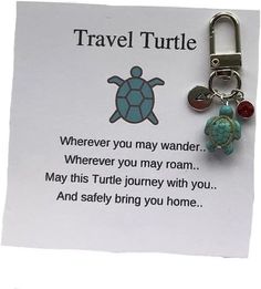 a keychain with a turtle charm attached to it