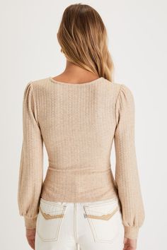 From autumn afternoons to winter evenings, stay cute and toasty in the Lulus Cozy Affection Beige Pointelle Knit Balloon Sleeve Top! Soft and stretchy ribbed pointelle knit shapes long balloon sleeves with fitted cuffs. V-neckline tops a figure-hugging bodice that ends at a cropped hem. Fit: This garment fits true to size. Length: Size medium measures 20.5" from shoulder to hem. Bust: Great for any cup size. Waist: Fitted - stretchy fabric allows custom fit. Undergarments: May be worn with any s Pointelle Top, Balloon Sleeve Top, Lulu Fashion, Pointelle Knit, Long Balloons, Cup Size, Balloon Sleeves, Stretchy Fabric, Custom Fit