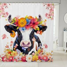 a shower curtain with a cow wearing a flower crown