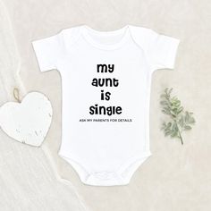 Funny Text About Aunt Baby Onesie Baby Shower Gift My Aunt is Single Baby Onesie Funny Baby Clothes Auntie Baby Onesie HOW TO ORDER:1) Choose onesie2) Select design color if applicable3) Enter customization in “Add your personalization” field4) ADD TO CART5) Select from our shipping class optionsONESIE SIZES0-3 Months :: 21-24 in. / 6-12 Ibs.3-6 Months :: 24-26 in. / 12-16 Ibs.6-9 Months :: 26-28 in. / 16-20 Ibs.12 Months :: 28-30 in. / 20-24 Ibs.PERSONALIZATIONIF the item includes personalizati Funny Onesie Ideas, Mother's Day White Onesie With Letter Print, White Onesie For First Birthday On Mother's Day, Funny Aunt Onesie, Baby Onsies Funny, Auntie Baby Clothes, Motherhood Aesthetic, Aunt Baby Clothes, Aunt Onesie