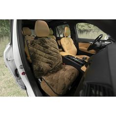 the interior of a car with an animal seat cover on it's back end