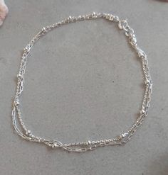 "Sterling Silver Anklet, Layered Anklet, Double Chain Anklet, Ankle Bracelet, Multi Standard Silver Anklet, Dainty Anklet Sterling Silver Beautiful double chain anklet bracelet for everyday. Very delicate, simple and dainty . Length - 9\" + 1.5\" adjustable chain extender. If you would like this chain altered, please convo me. All my jewelry are packed in an elegant gift box. If you want to give it as a gift you can specify the address and I'll be happy to send it on your behalf. To see more, pl Dainty Silver Jewelry, Anklets Silver, Elegant Anklet, Silver Chain Anklet, Hand Jewelry Rings, Dainty Anklet, Anklet Silver, Double Bracelet, Blue Opal Necklace