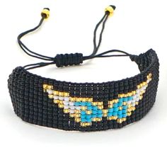 Miyuki Seed Bead Adjustable Bracelet Black / Blue Wings Brand New Boutique Item Offers Welcome Bundle & Save! Adjustable Black Friendship Bracelet With Colorful Beads, Black Letter Beads Bracelet For Beach, Trendy Black Beaded Bracelets With Tiny Beads, Black Bracelets With Letter Beads For Beach, Casual Black Friendship Bracelet With Black Beads, Casual Black Beaded Friendship Bracelets, Black Bohemian Letter Beads, Bohemian Black Letter Beads, Black Festival Bracelets With Tiny Beads