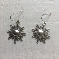 ☀️ Sun earrings, sun lover gift, statement big suns for your ears, Tibetan silver sun earrings, perfect for summer or sun lovers! ☀️ I've made these using Tibetan silver charms hung from good quality silver plated earrings. ☀️ There's plenty of detail and they make a brilliant present or a summery treat for yourself. ☀️ Sun measures approximately 1 1/4" (just under 3 cm) long. ☀️ I post out the same day or worst case scenario the next, unless it's the weekend then it's first thing Monday - I pri Silver Jewelry For Everyday Summer Wear, Everyday Summer Silver Jewelry, Sterling Silver Earrings For Everyday Summer Wear, Sunburst Earrings As Gift, Sunburst Shaped Jewelry As Summer Gift, Bohemian Summer Jewelry With Sun And Moon Design, Bohemian Sun And Moon Design Jewelry For Summer, Sunburst Shape Summer Gift Jewelry, Summer Sunburst Jewelry Gift