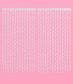 an abstract pink background with white lines and tiny dots on the bottom left side of the screen