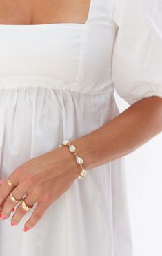 Elegant Beaded Pearl Bracelet In 14k Gold, Elegant Everyday Cream Bracelets, White 14k Gold Filled Pearl Chain Bracelets, White 14k Gold Filled Pearl Chain Bracelet, White 14k Gold-filled Bracelets With Pearl Chain, Adjustable White Pearl Bracelet In 14k Gold Filled, Elegant White Pearl Bracelet 14k Gold Filled, White 14k Gold-filled Beaded Wedding Bracelets, White 14k Gold-filled Beaded Bracelets For Wedding