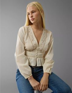 AE Embroidered Peplum Top Casual Embroidered V-neck Top For Fall, Casual V-neck Top With Embroidered Sleeves, Casual V-neck Blouse With Embroidered Sleeves, Casual V-neck Blouse With Embroidered Hem, V-neck Tops With Embroidered Hem, Fall Cotton V-neck Embroidered Top, Beige Floral Embroidered V-neck Blouse, Embroidered V-neck Top For Fall, Beige V-neck Blouse With Floral Embroidery