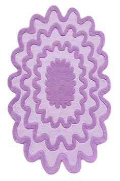 a purple rug with an intricate design on the top and bottom, is shown in front of a white background