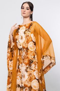 Ochre panelled kaftan with floral prints and front tie-up detailing.
Components: 1
Pattern: Printed
Type Of Work: Floral
Neckline: Round
Sleeve Type: Kaftan sleeves
Fabric: Chiffon and organza
Color: Yellow
Other Details: 
Tie-up detailing
Panelled detailing
Occasion: Party - Aza Fashions Summer Floral Print Georgette Kaftan, Summer Georgette Kaftan With Floral Print, Bohemian Georgette Kaftan With Floral Print, Kaftan Sleeves, Kaftan Women, Kaftan For Women, Types Of Work, Yellow Floral, Aza Fashion