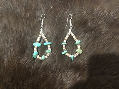 Authentic Beautiful Navajo Zuni oversized teardrop shaped hoop earrings with Turquoise and Heishi beads.  Handcrafted by Navajo Artist Harriet Crosby Great for a Gift ❤️ Earrings are 2.25" Hoop Earrings are SO popular right now.. These are perfect for Hoop Lovers! They are large enough to be seen from a far. Perfect hoops to go with Jeans and Boots! Southwestern Style Teardrop Dangle Earrings, Bohemian Teardrop Jewelry With Ear Wire, Bohemian Teardrop Jewelry With Dangling Beads, Handmade Southwestern Turquoise Teardrop Earrings, Handmade Turquoise Teardrop Earrings Southwestern Style, Handmade Turquoise Teardrop Earrings In Southwestern Style, Bohemian Teardrop Pendant Jewelry With Ear Wire, Southwestern Style Beaded Dangle Hoop Earrings, Handmade Southwestern Dangle Teardrop Earrings