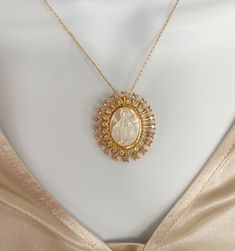 Miraculous Virgin Mary necklace MATERIAL AND SIZE Mother of pearl medal Medal size: 3.5cmx3.1cm 18k Gold filled chain Length: 18 inches or 45cm If you have questions about the product, feel free to reach me out. Don't forget to check out my other items in the store: Https://www.etsy.com/shop/nyahwithlove Less Shipping and return policies Estimated arrival Mar 20-29 Mar 17 Order placed Mar 18-22 Order ships Mar 20-29 Delivered! Cost to ship $3.45 Returns & exchanges Not accepted But please co Miraculous Medal Jewelry Gift For Mother's Day, Miraculous Medal Necklace For Mother's Day Gift, Elegant Miraculous Medal Jewelry For Gift, Elegant Miraculous Medal Jewelry Gift, Spiritual Wedding Miraculous Medal Jewelry, Mother's Day Gift Jewelry With Miraculous Medal, Spiritual Miraculous Medal Pendant Jewelry, Round Miraculous Medal Necklace For Anniversary, Elegant Miraculous Medal Pendant Necklace