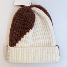 Conquer The Cold With Sleek Comfort That Provides Needed Warmth While Also Giving A Layer Of Traditional Flair To Your Wardrobe. With A Minimalist Two-Toned Design, Ribbed Fabric, And A Fold-Over Rim, This Multipurpose Beanie Steals The Spotlight, Elevating Your Upcoming Outfits And Equipping You Insulation On The Cold Days To Come. This Beanie Is New With Tags And Ready To Welcome Its Next Happy Home. Materials: 100% Acrylic White Acrylic Hat For Fall, Trendy White Knit Hat, Happy Home, Ribbed Fabric, Cold Day, Insulation, Sleek, Women Accessories, Wardrobe