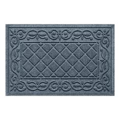 a blue door mat with an ornate design