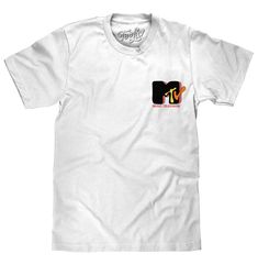 It's Time To Bring Bodacious Back... And yes, we're totally starting with this graphic tee! We've paid tribute to the channel that changed the world with a throwback, 80s art deco inspired t-shirt featuring a subdued MTV logo on the left chest, to a super striking version on the back. To ensure that this retro MTV shirt stands out - we've printed the graphic on a soft, white cotton tee. 100% Cotton Machine Wash Tumble Dry Regular Fit Printed in USA 90s Inspired White Graphic T-shirt, 90s Inspired Graphic Print T-shirt For Fans, 90s Inspired T-shirt With Graphic Print For Fans, Mtv Shirt, 80s Art Deco, 80s Logo, Mtv Logo, Mens 80s, 80s Art