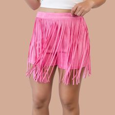 Embrace your inner free spirit with our Pink Horizon Skort. Featuring fringed suede and convenient eye and hook and zipper closures, this skort will add a touch of bohemian flair to your wardrobe. Perfect for festivals, concerts, or anywhere you want to make a statement. Fringe Suede Eye and Hook Zipper Color: Pink Material: Polyester | Spandex Inseam 3" | Rise 11" | Length 13" Model is wearing a size Small and her measurements are: Height: 5'3" | Bust: 34" | Waist: 27" | Hips: 40" Hippie Fringe Bottoms For Summer, Hippie Fringe Bottoms For Festival, Hippie Festival Bottoms With Fringe, Festival Hippie Bottoms With Fringe, Spring Festival Shorts With Fringe, Pink Fringe Bottoms For Summer, Summer Pink Bottoms With Fringe, Summer Pink Fringe Bottoms, Summer Festival Shorts With Fringe