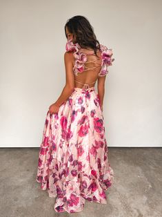 Organza Ruffle Shoulders V Neck Floral Tulle Maxi Dress -Back invisible zipper -Spaghetti strap a lace up back dressSELF: 100% POLYESTER LINING: 96% POLYESTER 4% SPANDEX Runs true to size. Model is wearing a small (34” bust, 26” waist, 35” hips, 5’6”) Bust Waist Length Sleeve Length Small 34 inches 28 inches 60 inches 4 inches Medium 36 inches 30 inches 60 inches 4 inches Large 38 inches 32 inches 60.5 inches 4 inches We measure each item from side seam to side seam, on a flat surface. Please co Fitted Dress With Lace-up Back And Ruffled Straps, Party Dresses With Lace-up Back And Ruffled Straps, Chic Prom Dress With Ruffled Straps, Spaghetti Strap Dresses With Ruffles For Prom Season, Flowy Maxi Dress With Ruched Back For Party, Feminine Ruffled Straps Prom Dress, Party Maxi Dress With Strappy Back, Feminine Prom Dress With Ruffled Straps, Pink Summer Dress With Lace-up Back