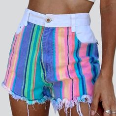 Be the envy of the streets in the 2023 Summer Collection of neon-striped distressed denim shorts! These stylish shorts combine street style with modern flare. offering a unique look that will make you stand out from the crowd.Distinctive Features: Painted Neon Stripes: The bold neon stripes add a touch of wild. vivid color that will make you the center of attention. Wide-Leg Design: The wide-leg design offers a modern silhouette. ensuring you look on-trend no matter the occasion. High-Waist: The Trendy Striped Shorts With Built-in Shorts, Striped High Waist Shorts For Summer, High Waisted Striped Shorts For Summer, High Waist Striped Shorts For Summer, Spring Multicolor Striped Bottoms, Striped High Waisted Summer Shorts, Multicolor Vertical Stripes Bottoms For Spring, Spring Multicolor Vertical Stripes Bottoms, Striped Jean Shorts For Summer